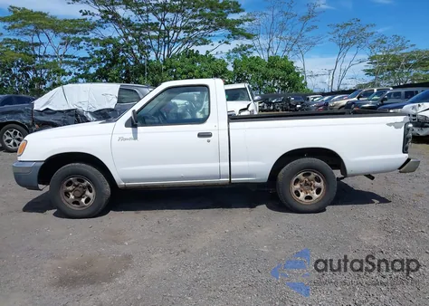 1999 Nissan Frontier Xe z USA, uszkodzony, nr VIN 1N6DD21S8XC318584